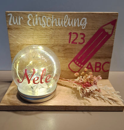 Klötzchenwand mit Blumen und Leuchtkugel "Zur Einschulung"