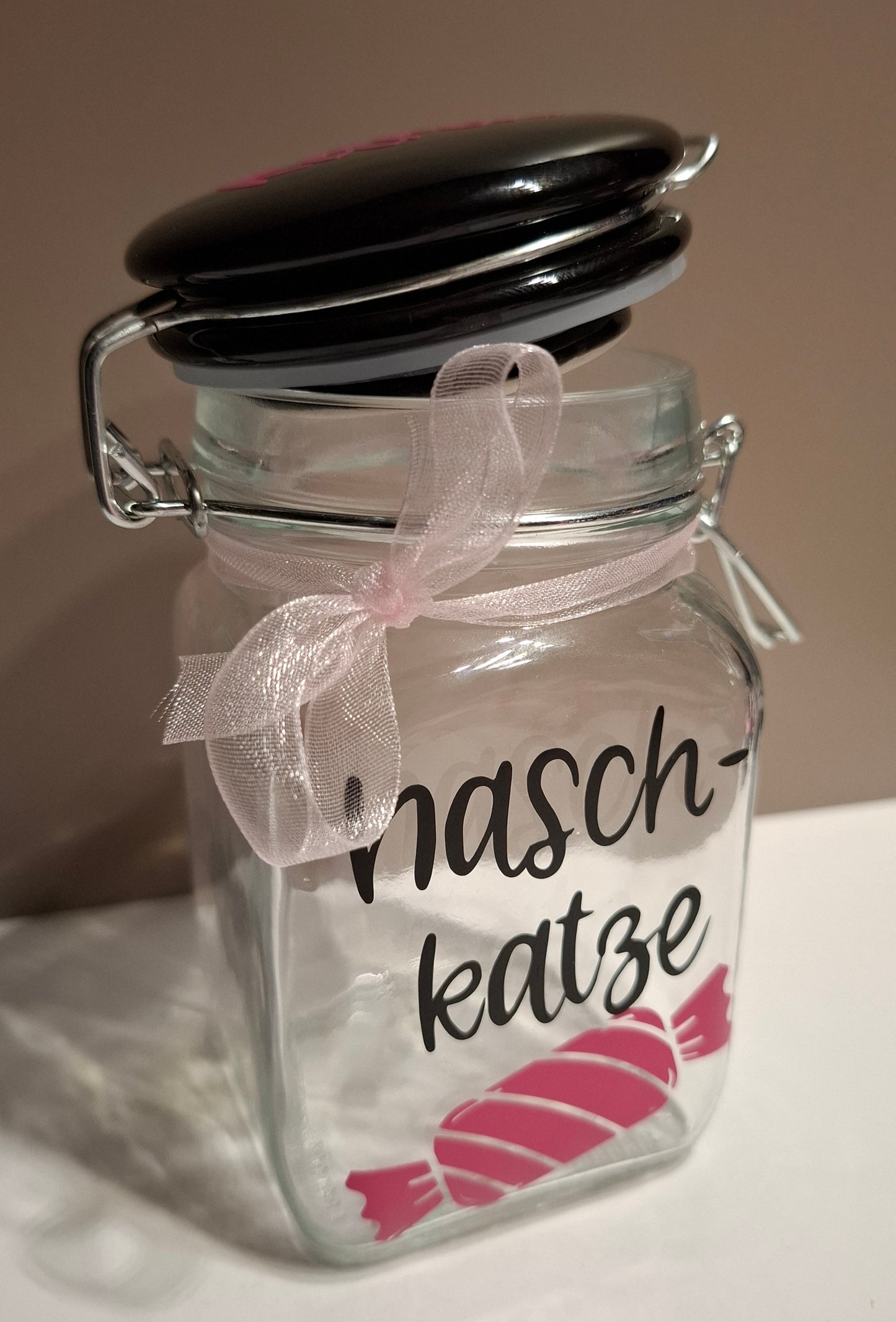 Kleines, personalisierbares Glas mit Bügelverschluss und der Aufschrift Naschkatze